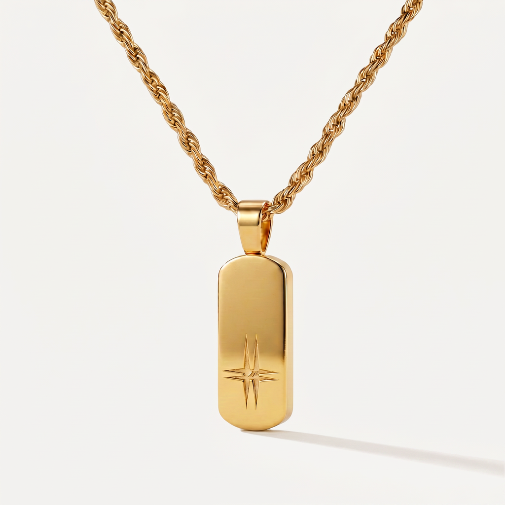 Colgante minimalista para hombre El Origen, acero 316L con baño de oro 18k